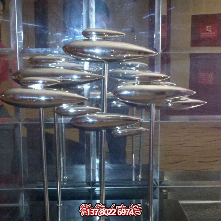 室內(nèi)售樓部不銹鋼鏡面創(chuàng)意抽象魚(yú)雕塑